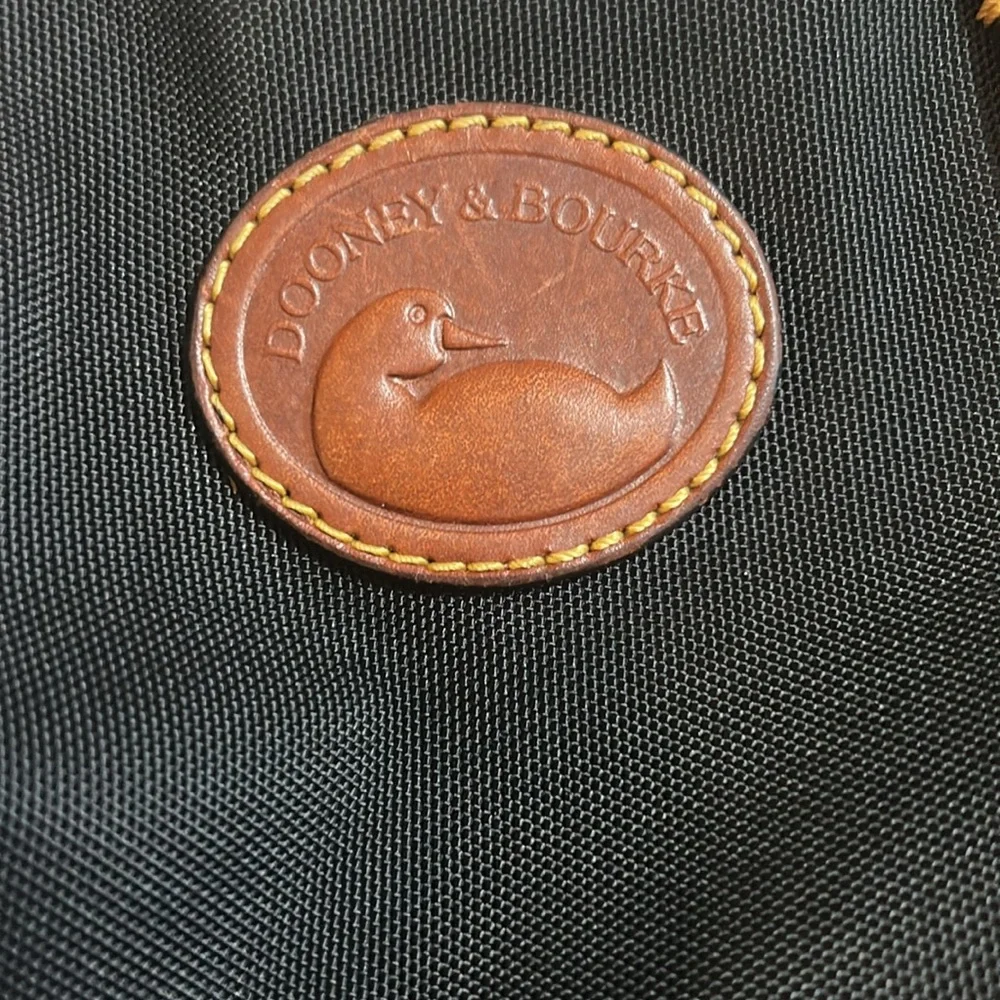 Dooney and Bourke black canvas tote with detachable shoulder strap. - Picture 3 of 5